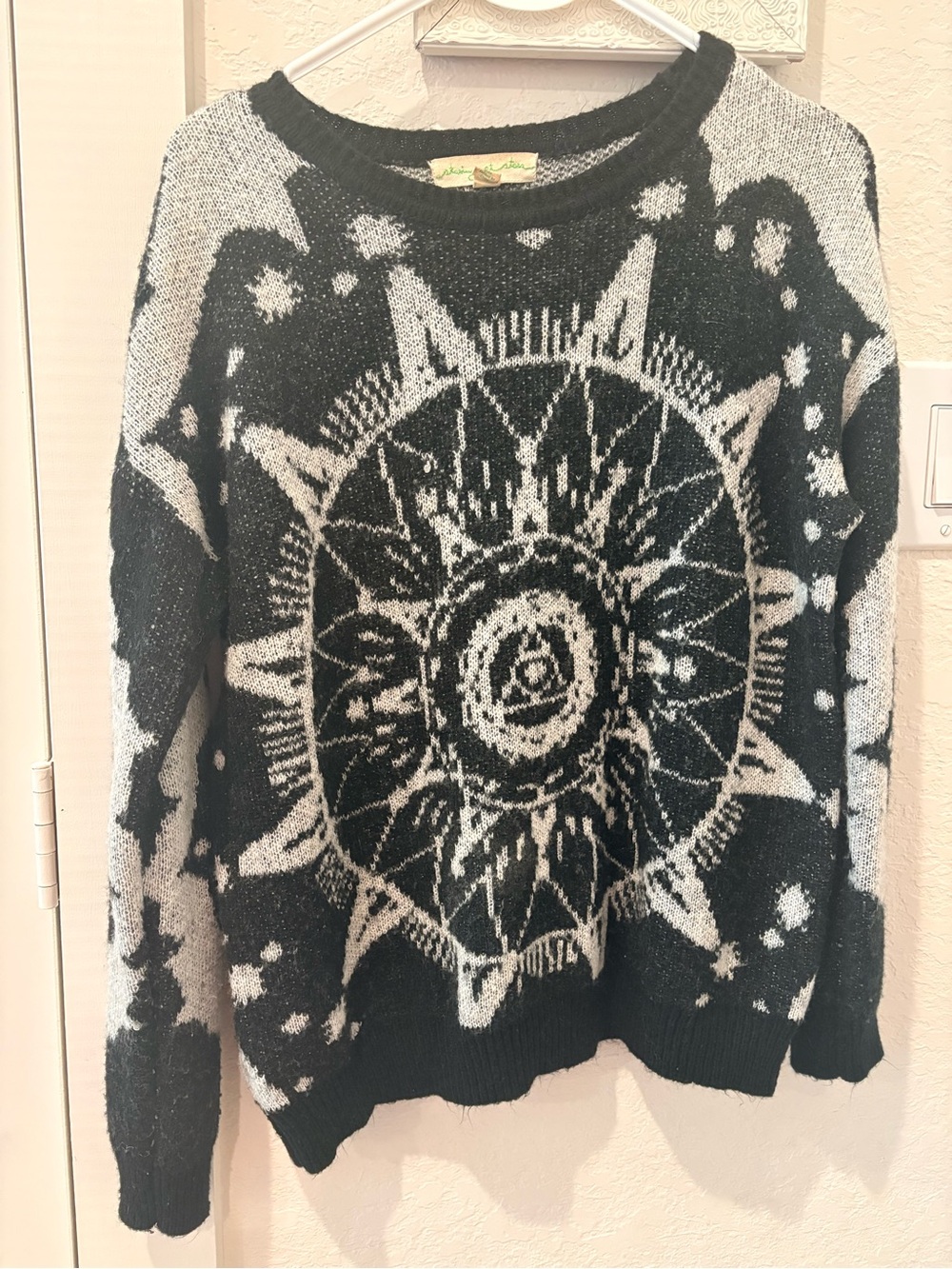 Illuminati Black & Cream Sun Motif Sweater
